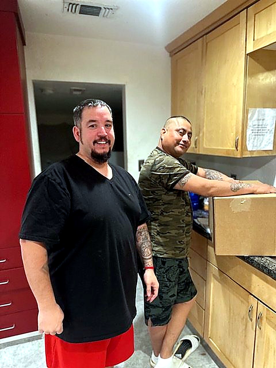 Two residents together in the kitchen
